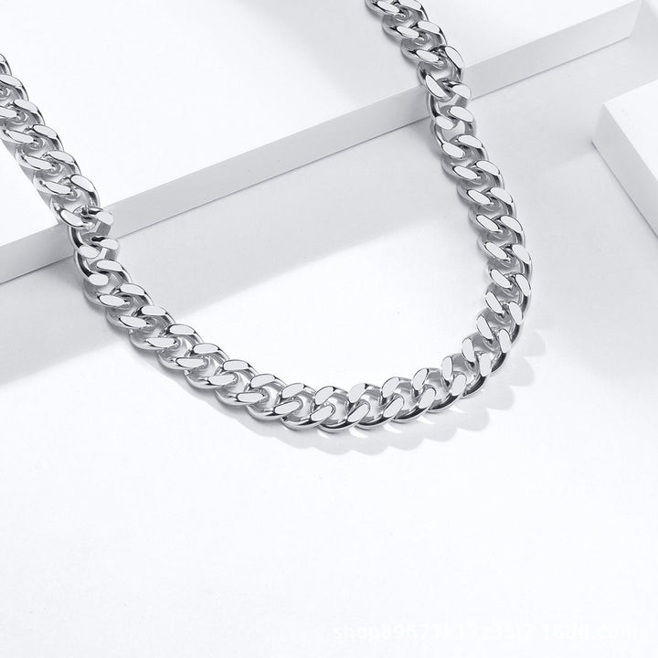 Chic unisex minimalist gold-tone accessory set. Modern necklace & bracelet for versatile, simple everyday fashion.