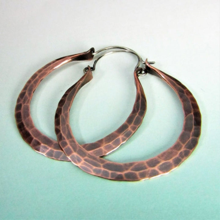 Eye-catching women's ethnic statement earrings. Long dangle design, retro style, ideal fashion accessory.