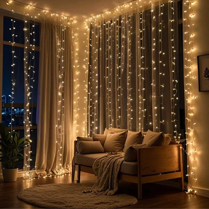 Elegant warm white LED curtain string lights, perfect backdrop for events & home decor.