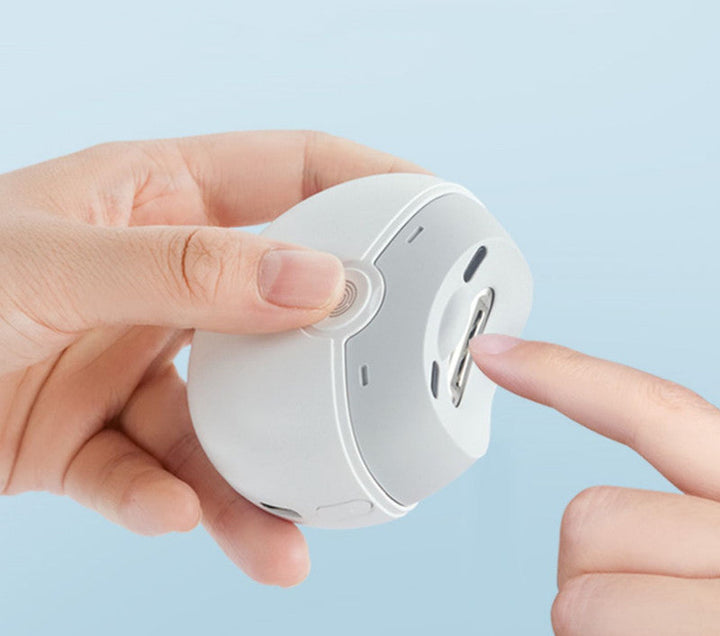 Rechargeable electric automatic nail clipper & grinder for safe, effortless personal care and grooming.