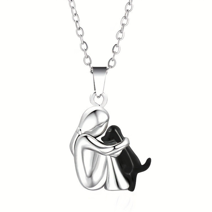 Everyday wear women's fashion accessory: a heartwarming girl & dog embrace pendant necklace.