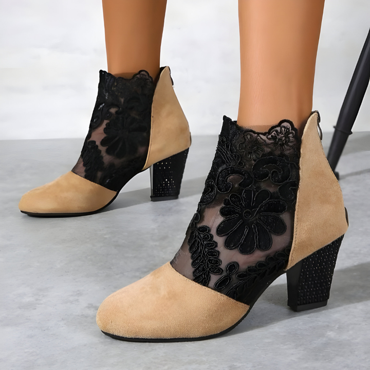 Close-up of elegant women's ankle strap block heels, showcasing comfort and classic design.