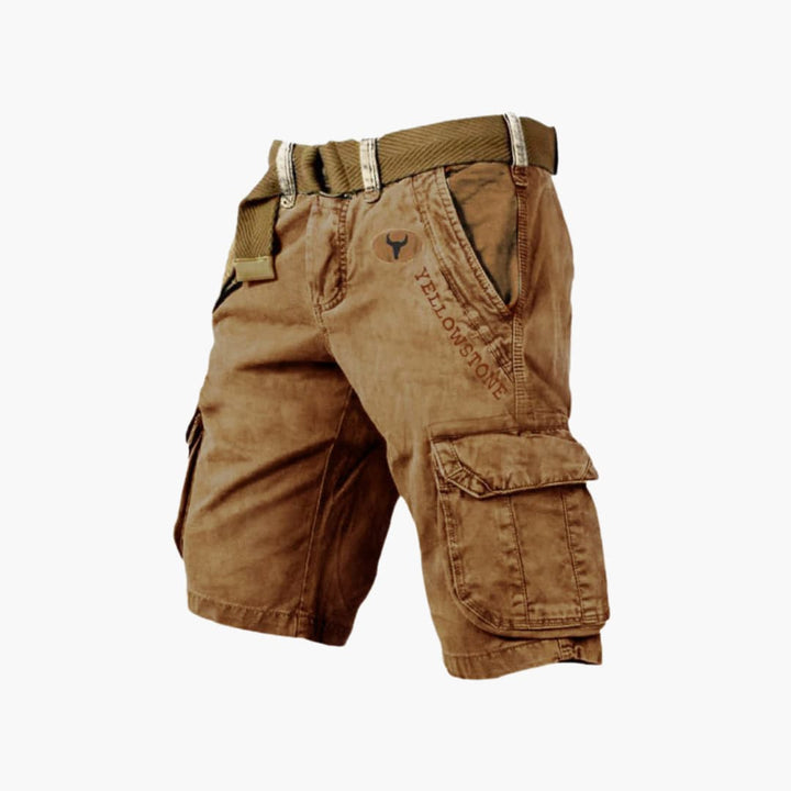 Man wearing gray cargo shorts, showcasing comfortable fit & multi-pocket utility for summer exploration.