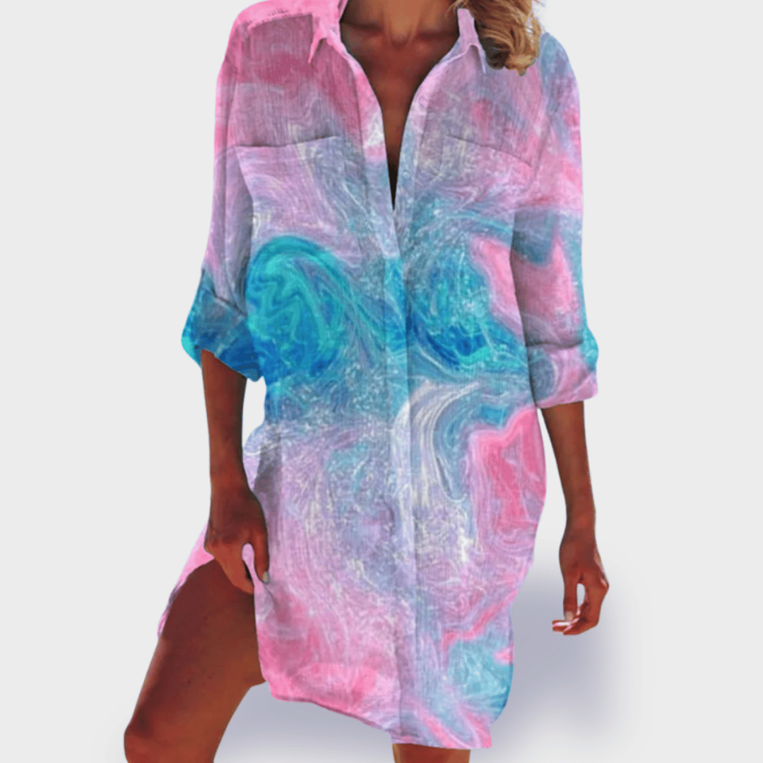 Vibrant colorful women's flowing midi dress, lightweight & comfortable for summer, perfect vacation style.