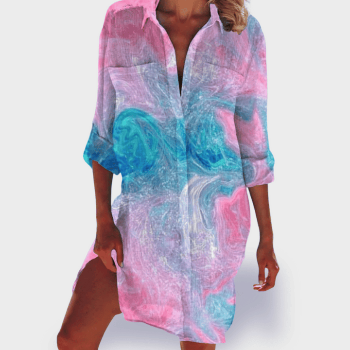 Vibrant colorful women's flowing midi dress, lightweight & comfortable for summer, perfect vacation style.