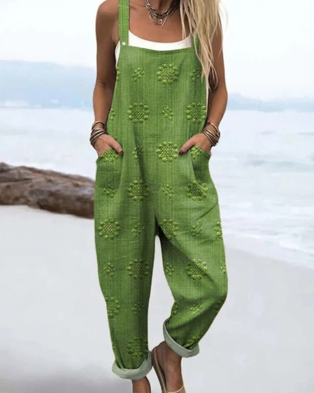 Comfortable, relaxed fit women's floral wide-leg jumpsuit. Ideal for effortless summer and casual wear.