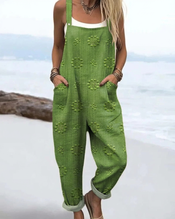 Comfortable, relaxed fit women's floral wide-leg jumpsuit. Ideal for effortless summer and casual wear.