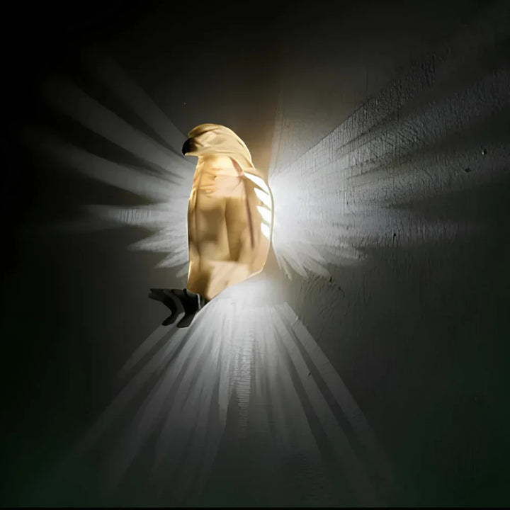 Stylish LED wall sconce featuring a luminous wing projection, perfect for artistic mood lighting.
