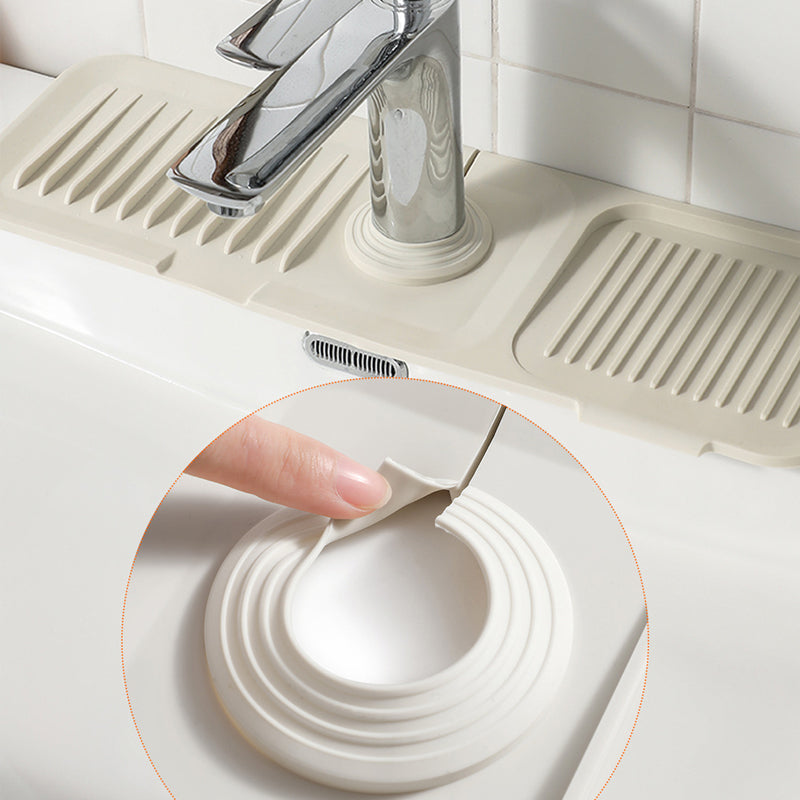 Improve kitchen organization with this versatile, self-draining silicone mat for sinks.