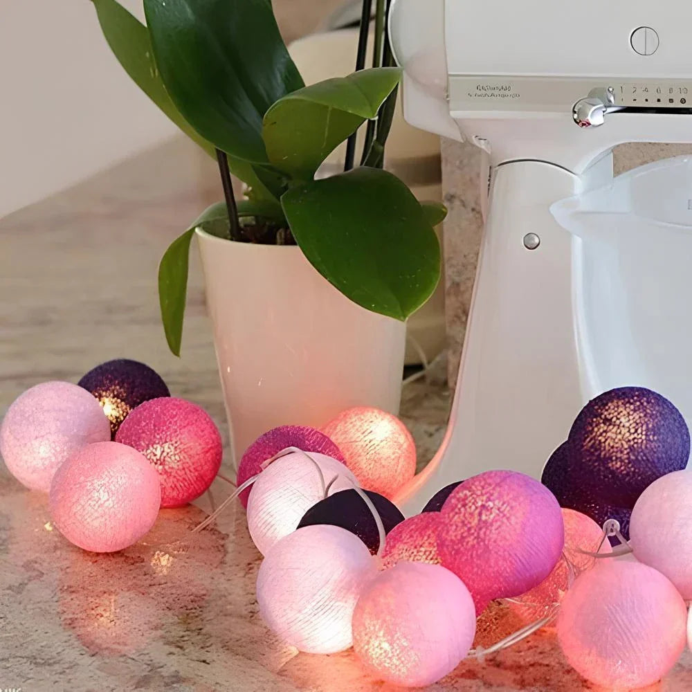 Durable cotton ball garland for long-lasting decorative room lighting & party decor.