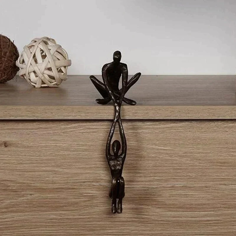 Abstract modern art figurine, symbolizing love & strength, perfect for living room or office decor.