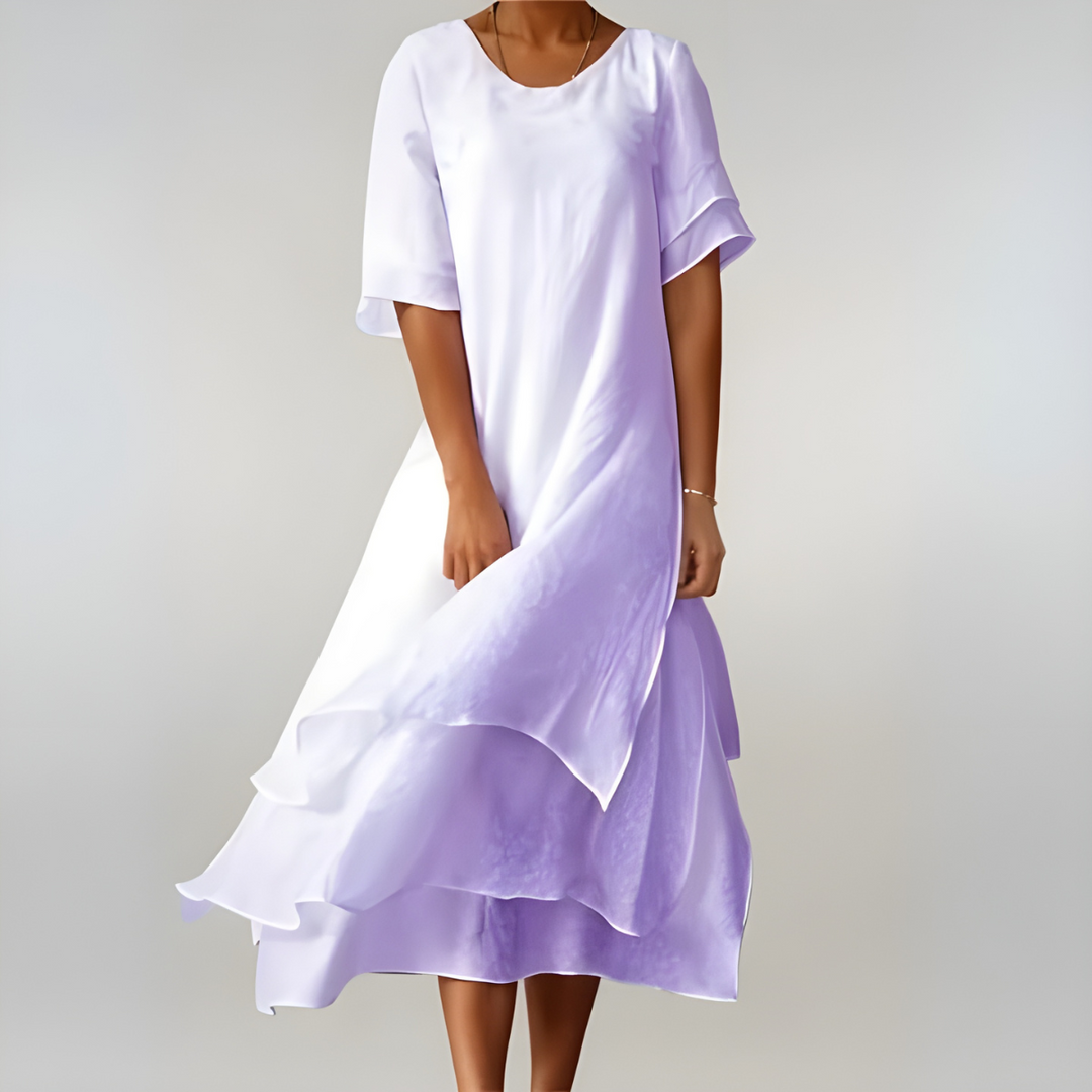 Yellow lightweight maxi dress for women. Elegant flowing silhouette, perfect for summer vacation and casual chic.