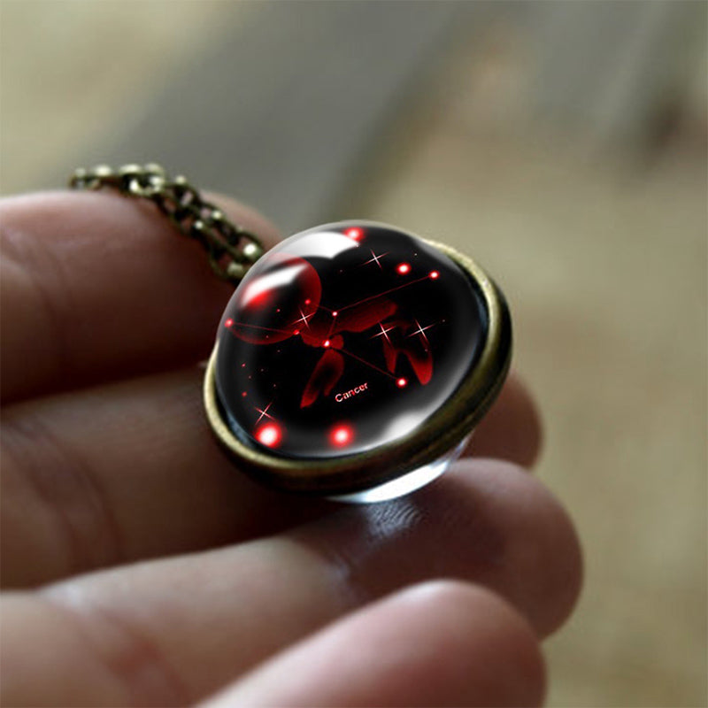 Elegant women's round glass pendant necklace featuring a specific zodiac sign for spiritual protection.