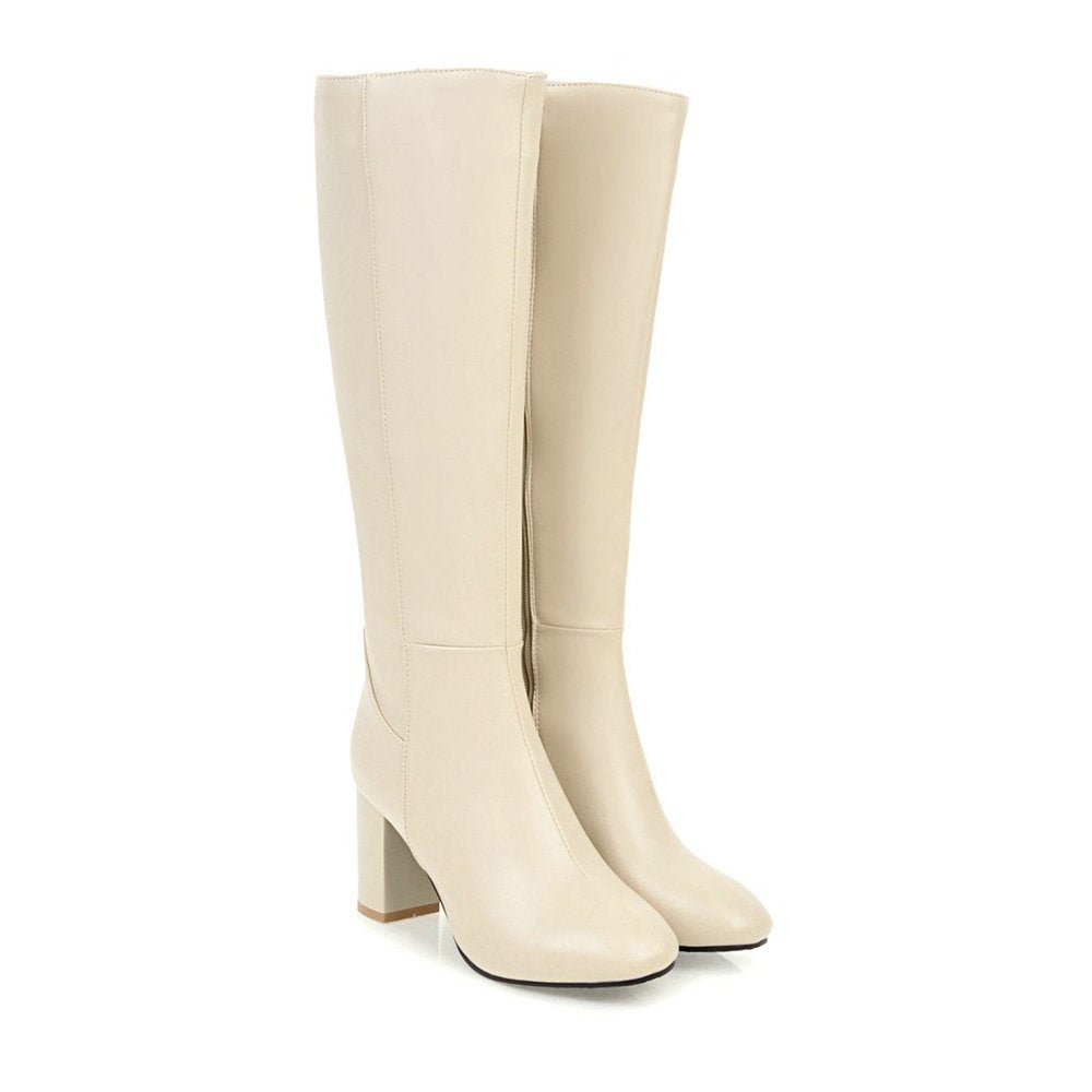 Women's knee-high block heel leather boots with a chic rounded toe & practical side zipper. Elegant style.