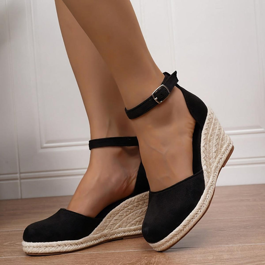 Women's casual wedge sandals with adjustable ankle strap for comfortable everyday summer wear.