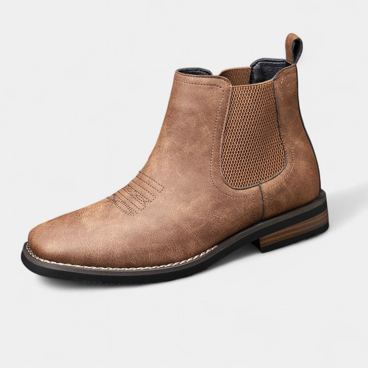 Classic men's versatile slip-on Chelsea boots, offering comfort and smart-casual appeal. Durable everyday footwear.