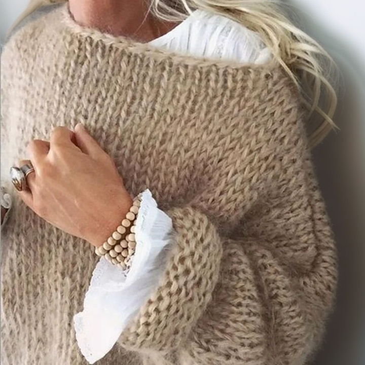 Cozy women's knit sweater, a comfortable pullover top for versatile everyday winter style and relaxed fashion.