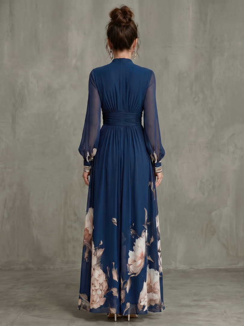Flowy women's long navy dress with delicate sheer pleated sleeves and a V-neck, suitable for special occasions.