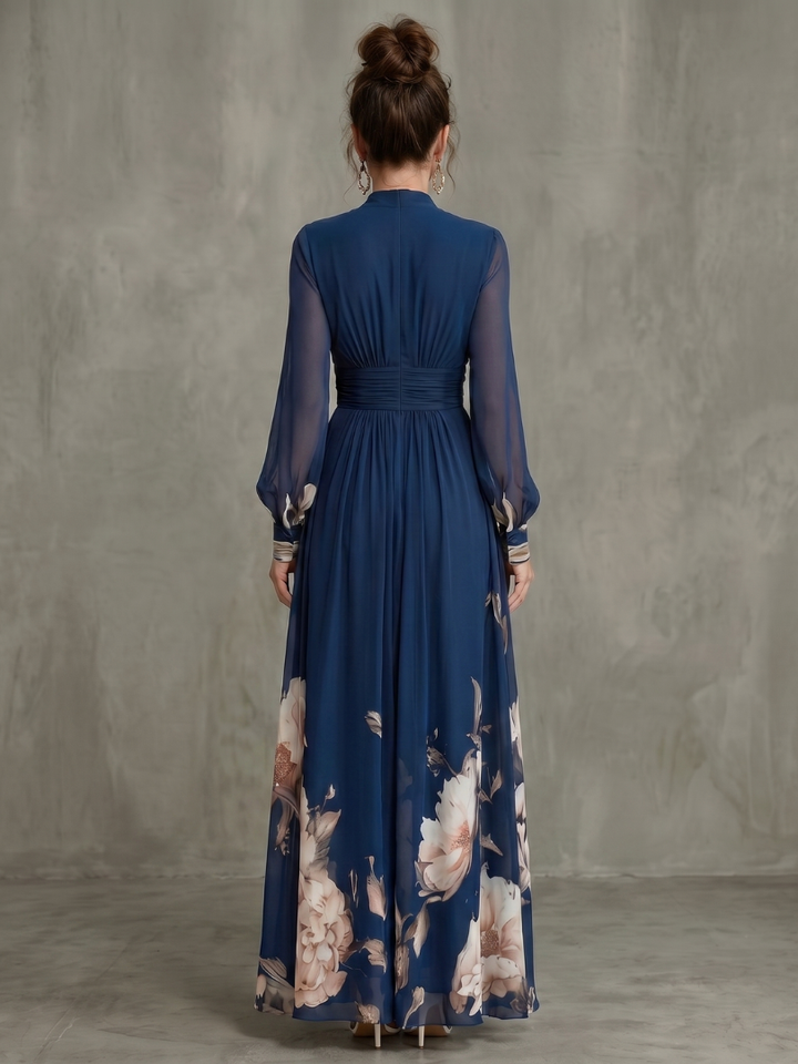 Flowy women's long navy dress with delicate sheer pleated sleeves and a V-neck, suitable for special occasions.