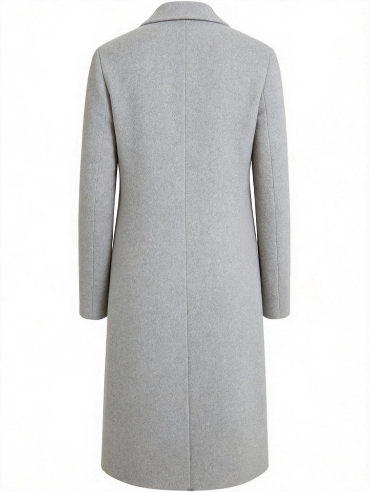 Elegant men's tailored long trench coat, a refined classic for business casual outfits.