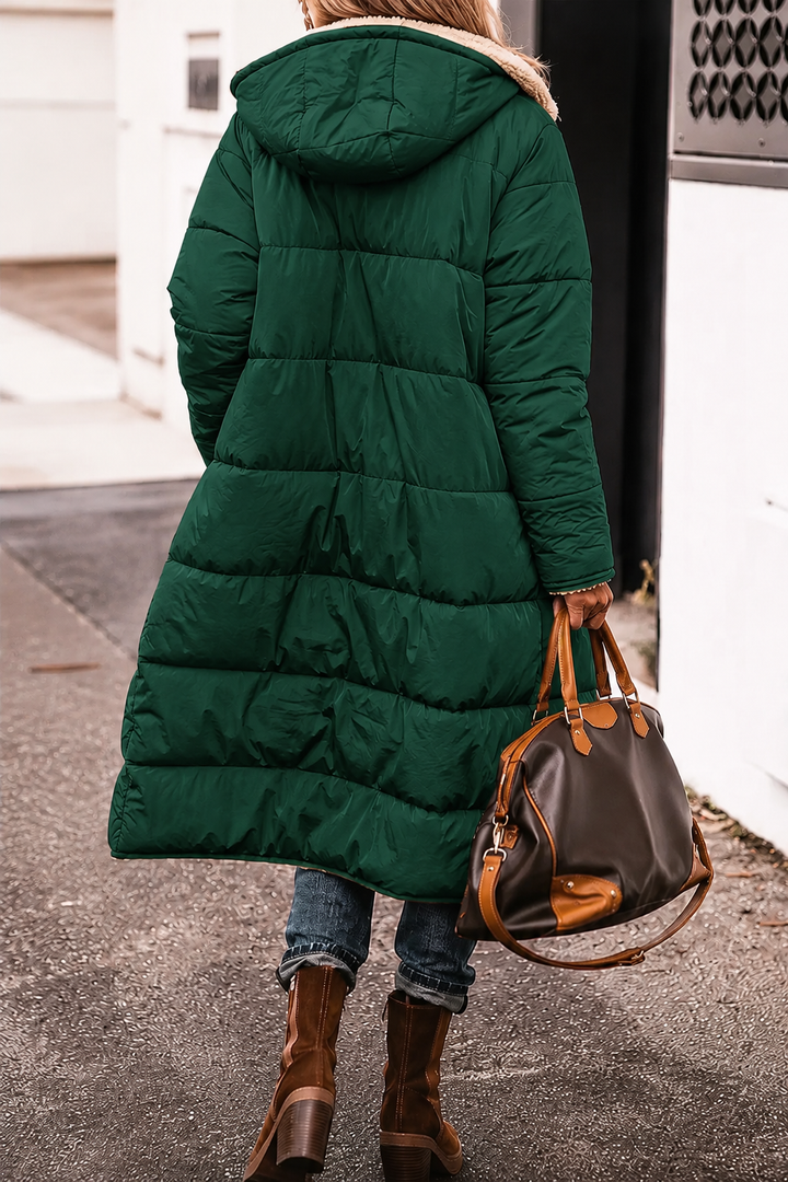 Women's reversible jacket for winter, offering comfort and adaptable styling.