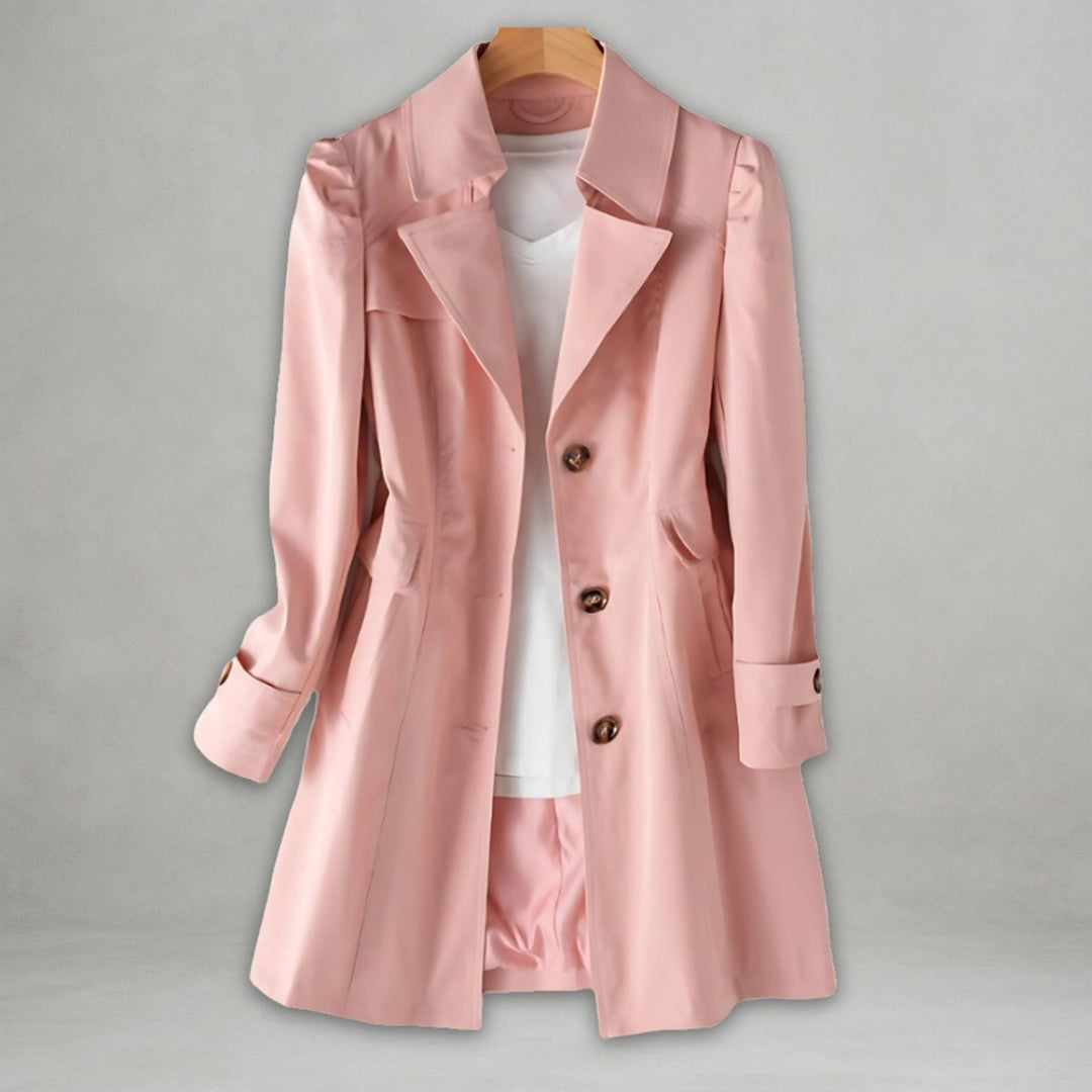 Stylish women's long trench coat, single-breasted design for a classic & elegant transitional outerwear look.