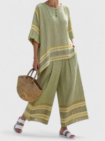 Casual chic women's two-piece set featuring an oversized top & wide-leg pants. A comfortable & complete stylish ensemble.