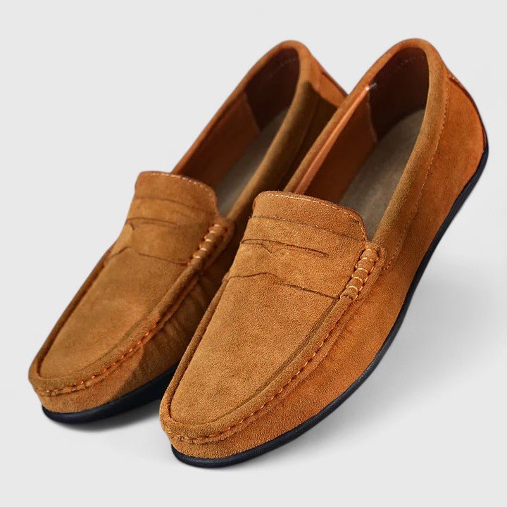 Premium leather men's slip-on loafers, lightweight & handstitched for superior comfort.