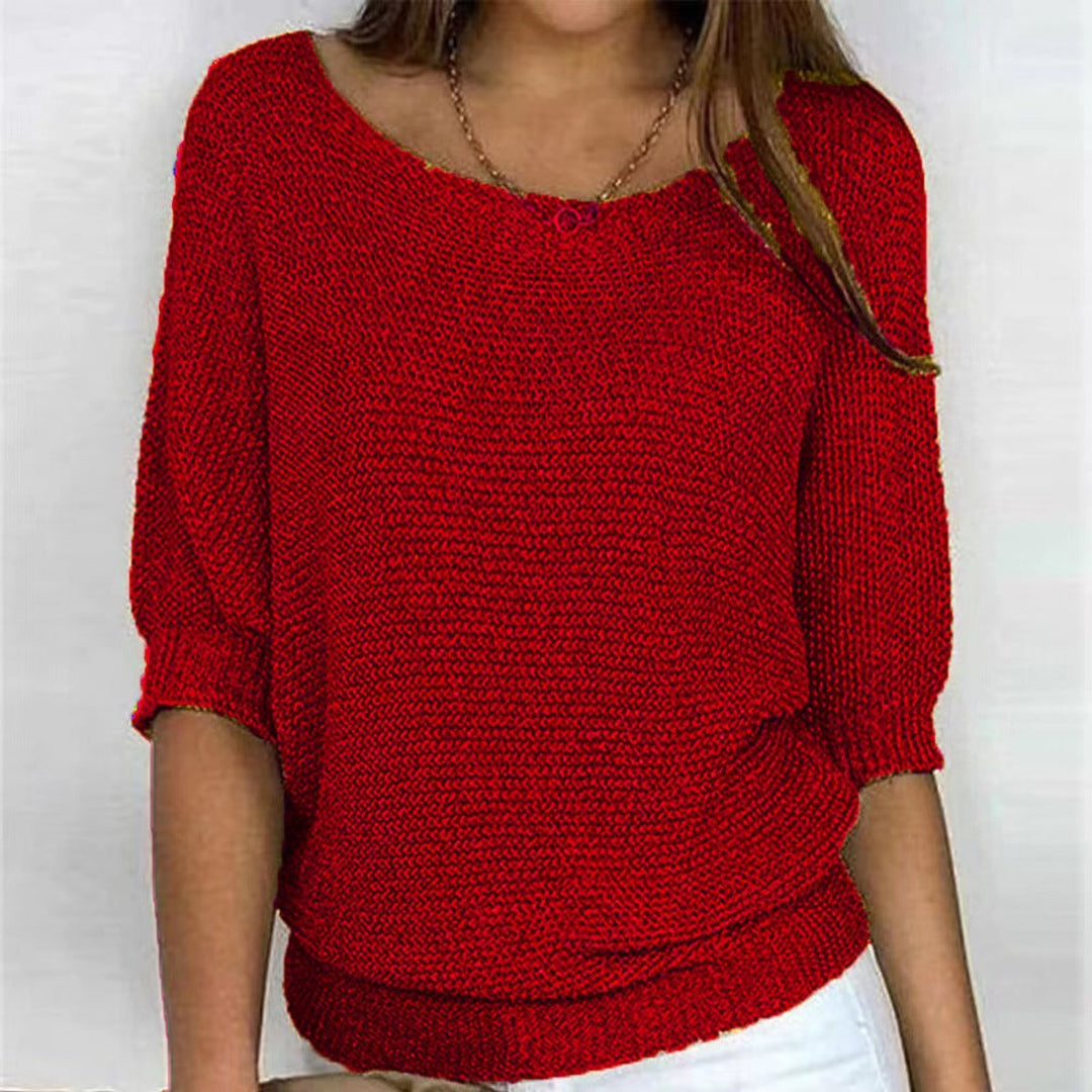 Relaxed fit women's long sleeve batwing sweater. Stylish oversized knit for cozy everyday fashion.