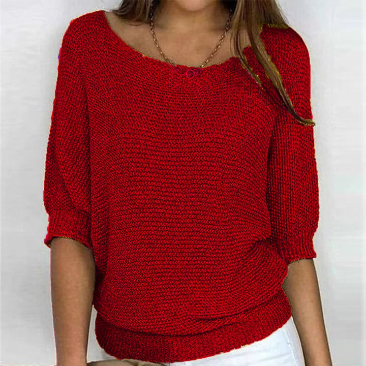 Relaxed fit women's long sleeve batwing sweater. Stylish oversized knit for cozy everyday fashion.