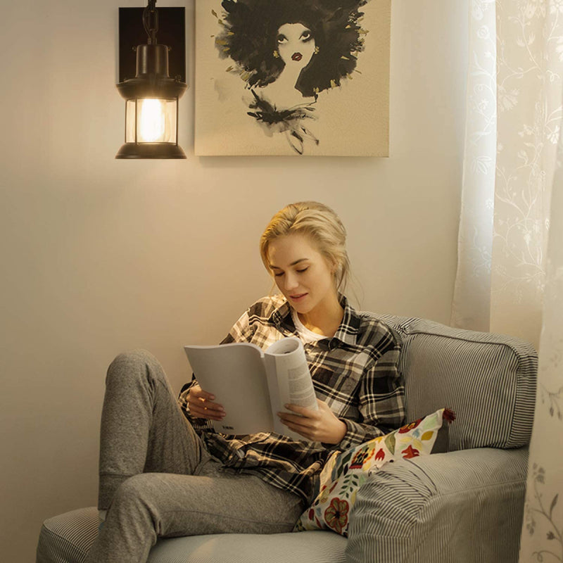 Vintage black wall lamp, an industrial indoor lighting solution for hallways & bedrooms.