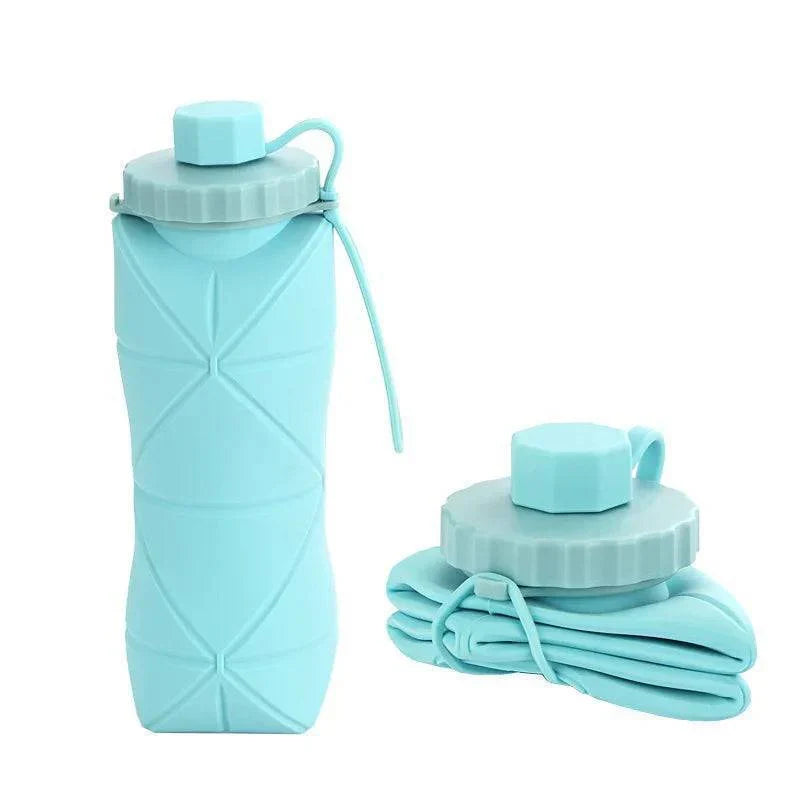 Eco-friendly collapsible water bottle, 20 fl oz, made of durable silicone for gym and outdoor use.