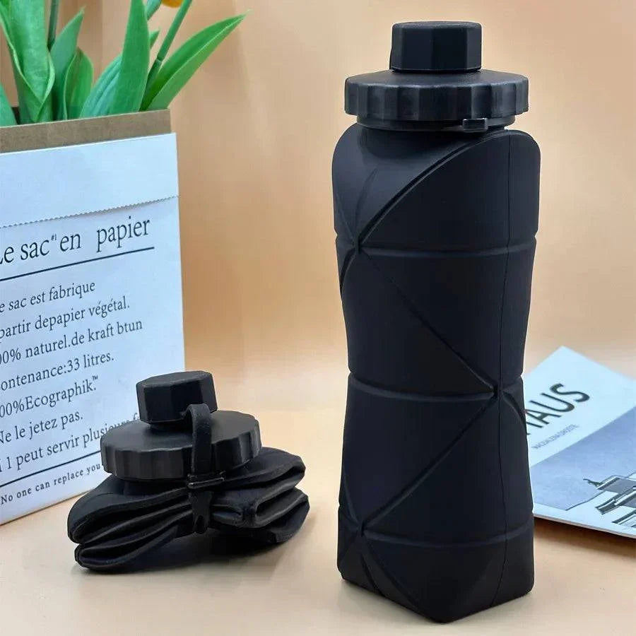Compact & portable 20 fl oz silicone water bottle; perfect for gym, sport, travel & hydration.