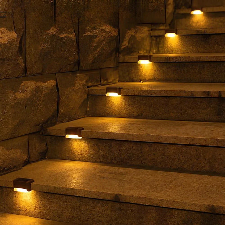 Weatherproof Nvroome solar LED step lights for outdoor pathways.