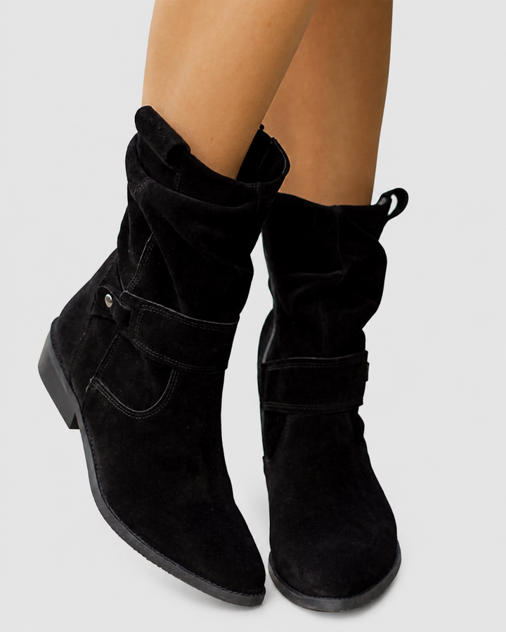 Orthopedic women's ankle boots with low heel, offering superior comfort and support.