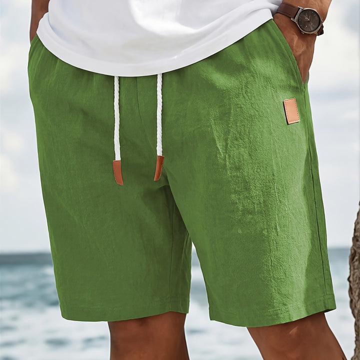 Stylish men's versatile shorts with a drawstring, relaxed fit, perfect for summer outings or home comfort.