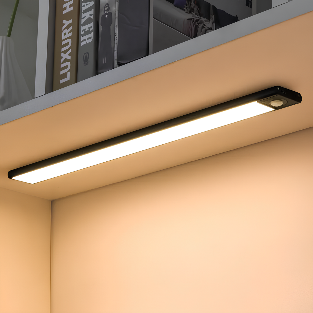 Smart wireless LED light bar with motion sensor for hands-free illumination in closets & kitchens.