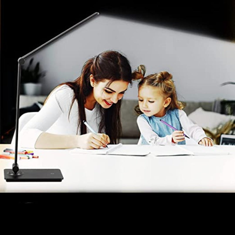 Modern foldable LED table lamp, USB powered, with touch control for dimmable light. Ideal for office or bedroom.
