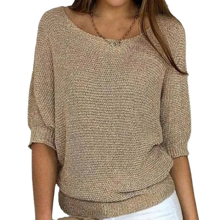 Women's relaxed oversized batwing sweater for cozy comfort & casual style. Ideal for fall fashion.