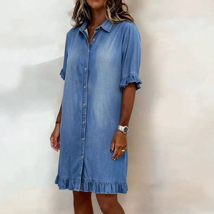 Women's faux denim ruffled shirt dress, perfect for casual everyday wear. Chic and feminine spring fashion.