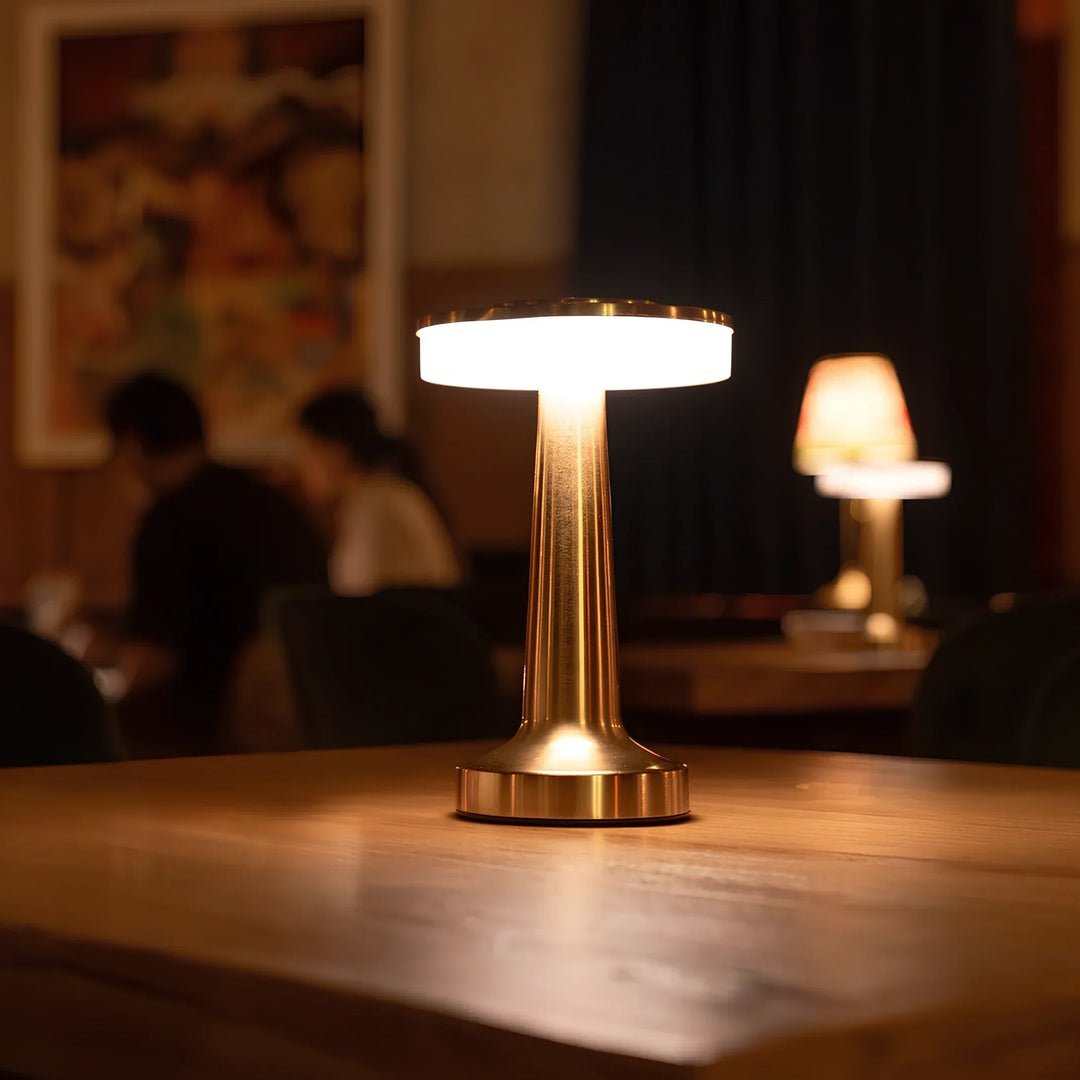 Metallic retro bar lamp, LED rechargeable. Cordless lighting solution for stylish home decor.