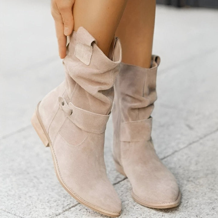 Fashionable women's slouchy knee-high boots with a sturdy block heel, offering style & comfort for any occasion.