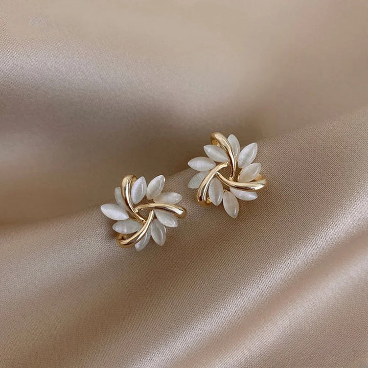 Sparkling gold opal flower earrings for women, featuring a delicate and elegant floral design.