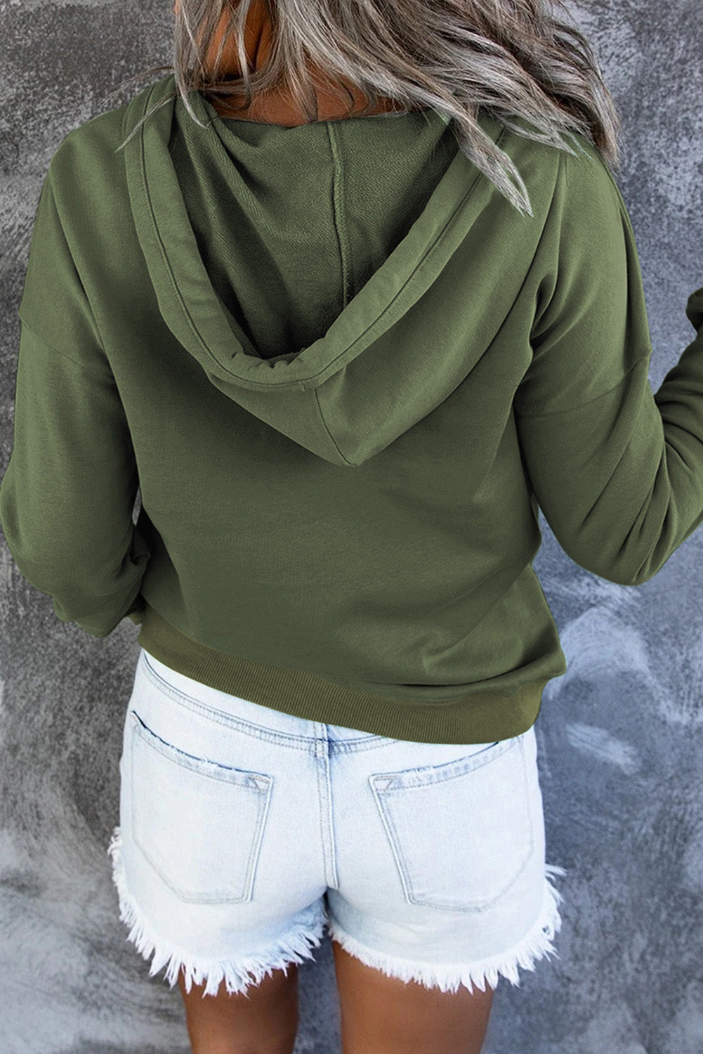 Cream women's cozy hooded sweater, a versatile everyday pullover for comfort.