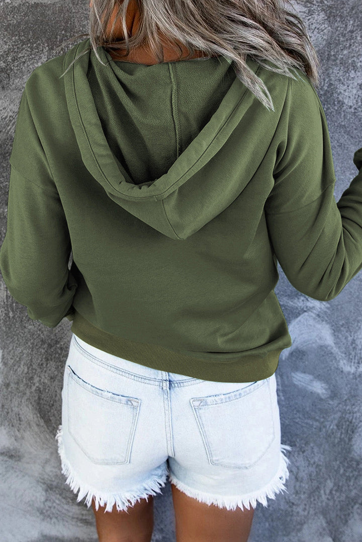 Cream women's cozy hooded sweater, a versatile everyday pullover for comfort.