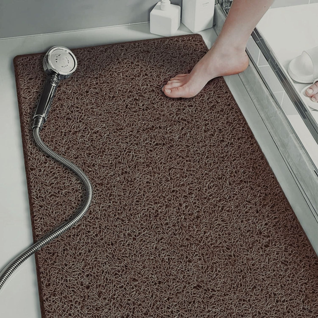 Anti-slip bathroom mat for enhanced home safety in showers, kitchens, and other wet areas.