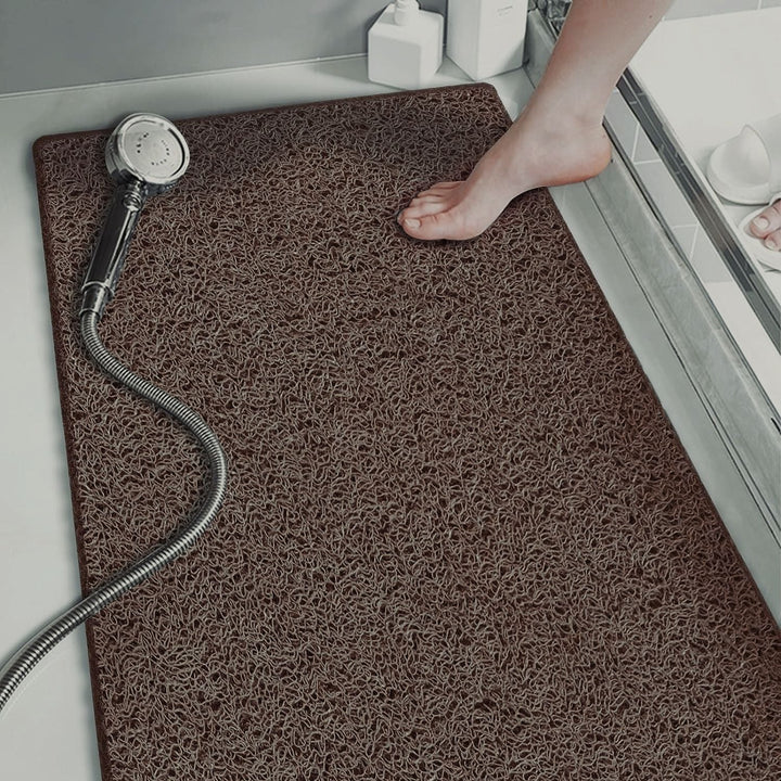 Anti-slip bathroom mat for enhanced home safety in showers, kitchens, and other wet areas.