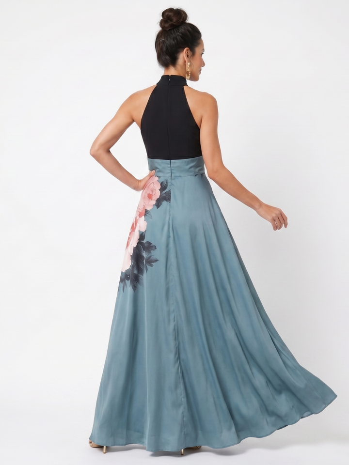 Chic women's summer floral maxi dress, halter neck with a playful front slit, great for parties.
