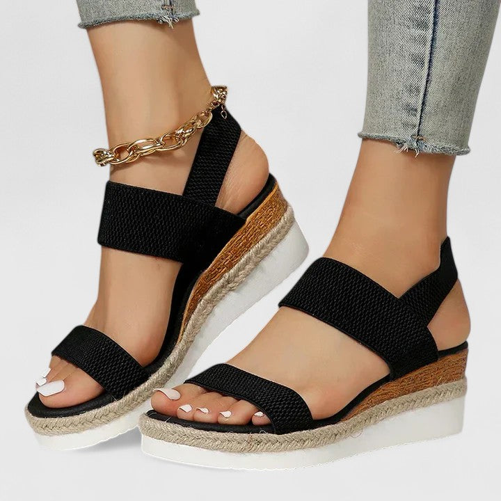 Daily wear women's sandals with orthopedic arch support and a soft cushioned design.