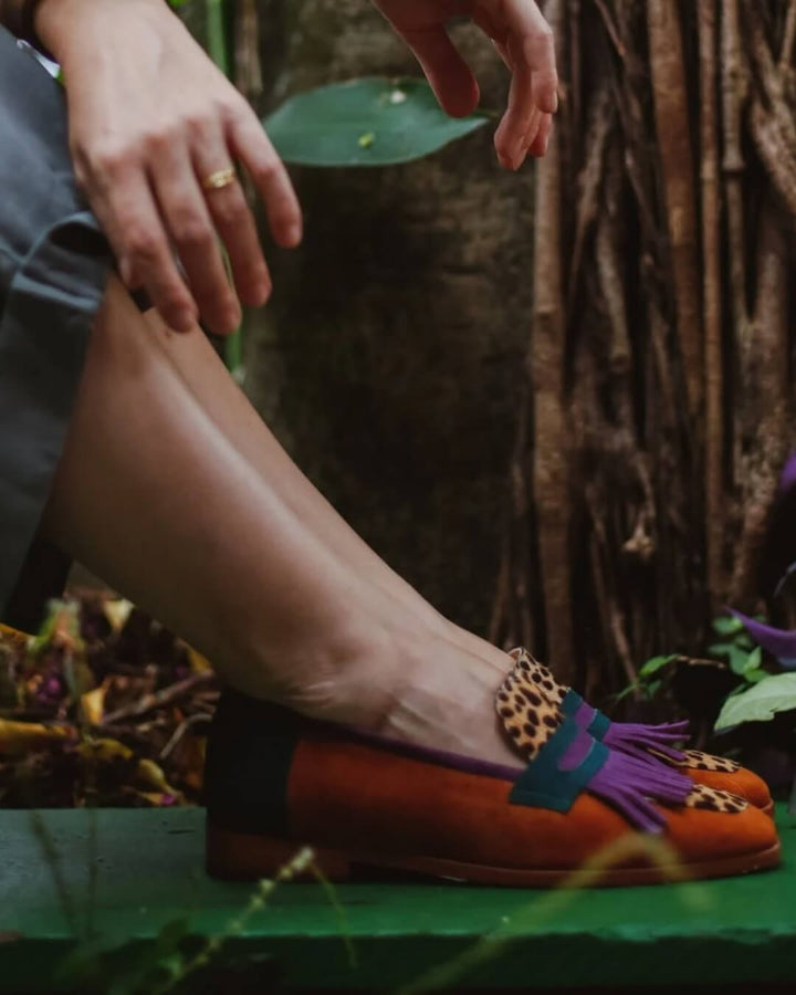 Fashionable women's animal print fringe loafers. Easy slip-on style for casual or dressy everyday outfits.